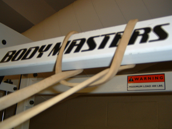 rubber band around squat rack